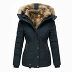 Dark blue winter jacket with fur-lined hood on a white background